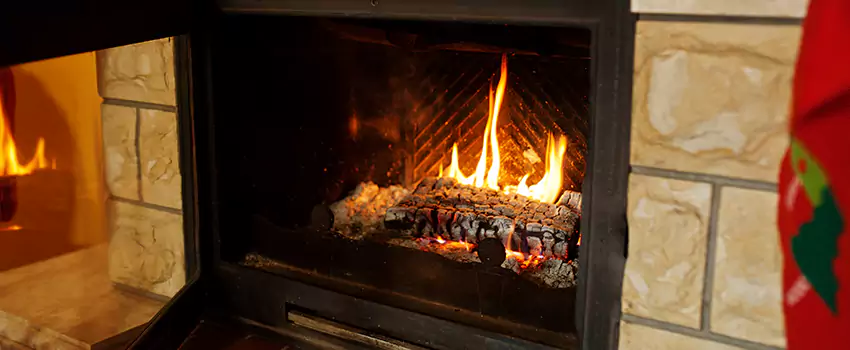 Commercial Prefabricated Fireplace Replacement in Bourget, Ontario